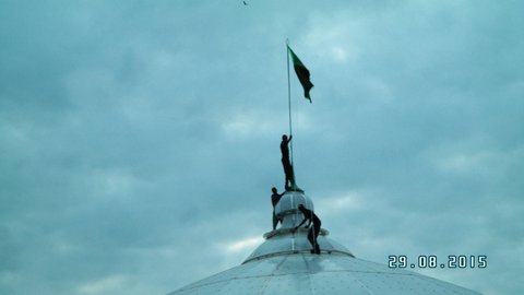 hoisting of flag on husainiyya